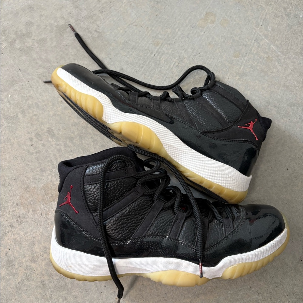 Jordan bred 11s Black Red